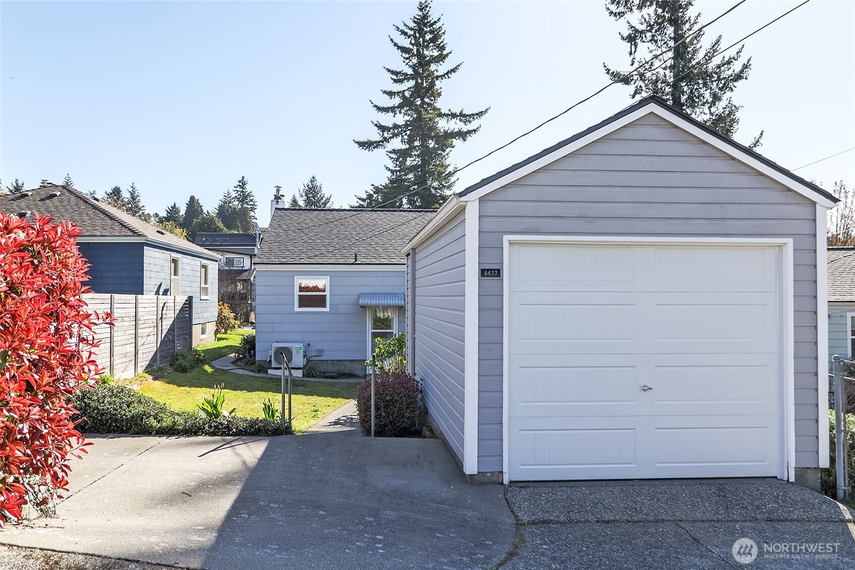 4437 47th Avenue Southwest Seattle, WA 98116 - Photo 5 of 39 a view of a back yard of the house
