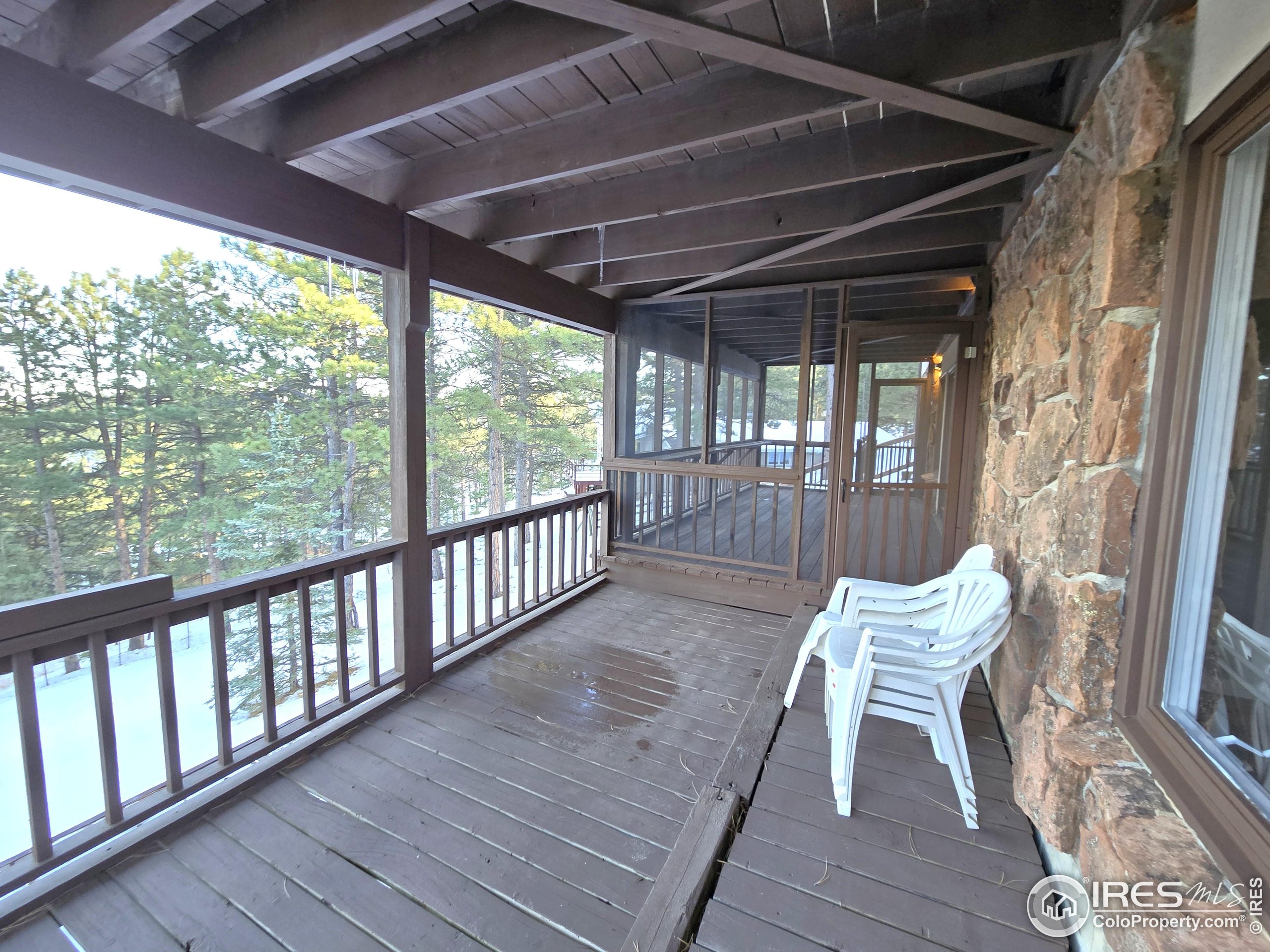 76 Pine Tree Lane Boulder, CO 80304 - Photo 34 of 49 a view of two chairs in the balcony