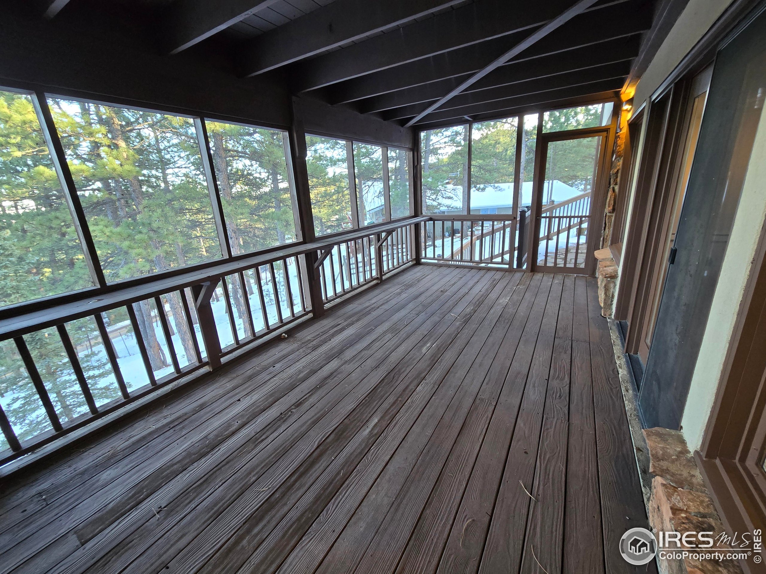 76 Pine Tree Lane Boulder, CO 80304 - Photo 36 of 49 a view of wooden deck