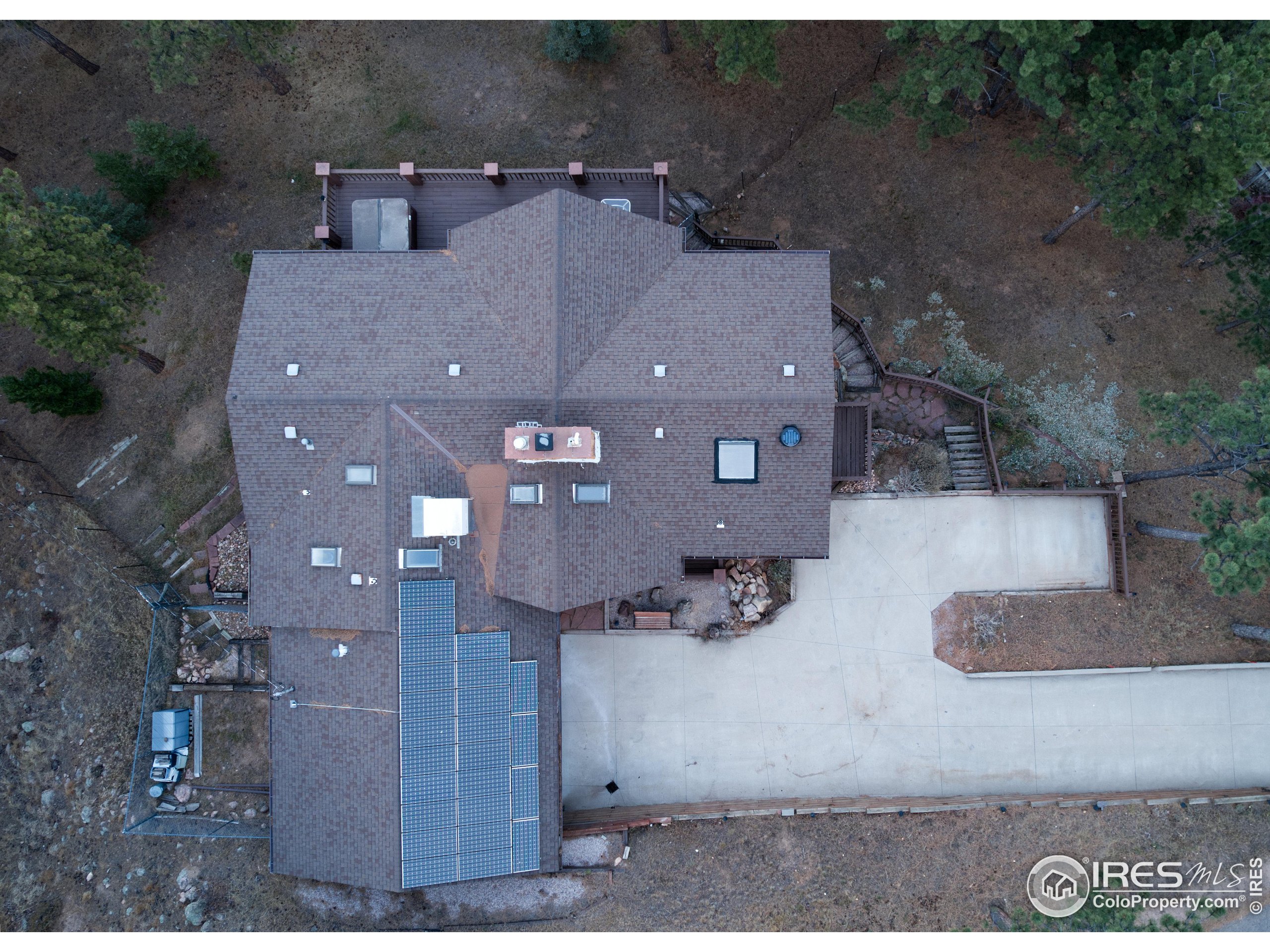 76 Pine Tree Lane Boulder, CO 80304 - Photo 41 of 49 an aerial view of a house with a yard
