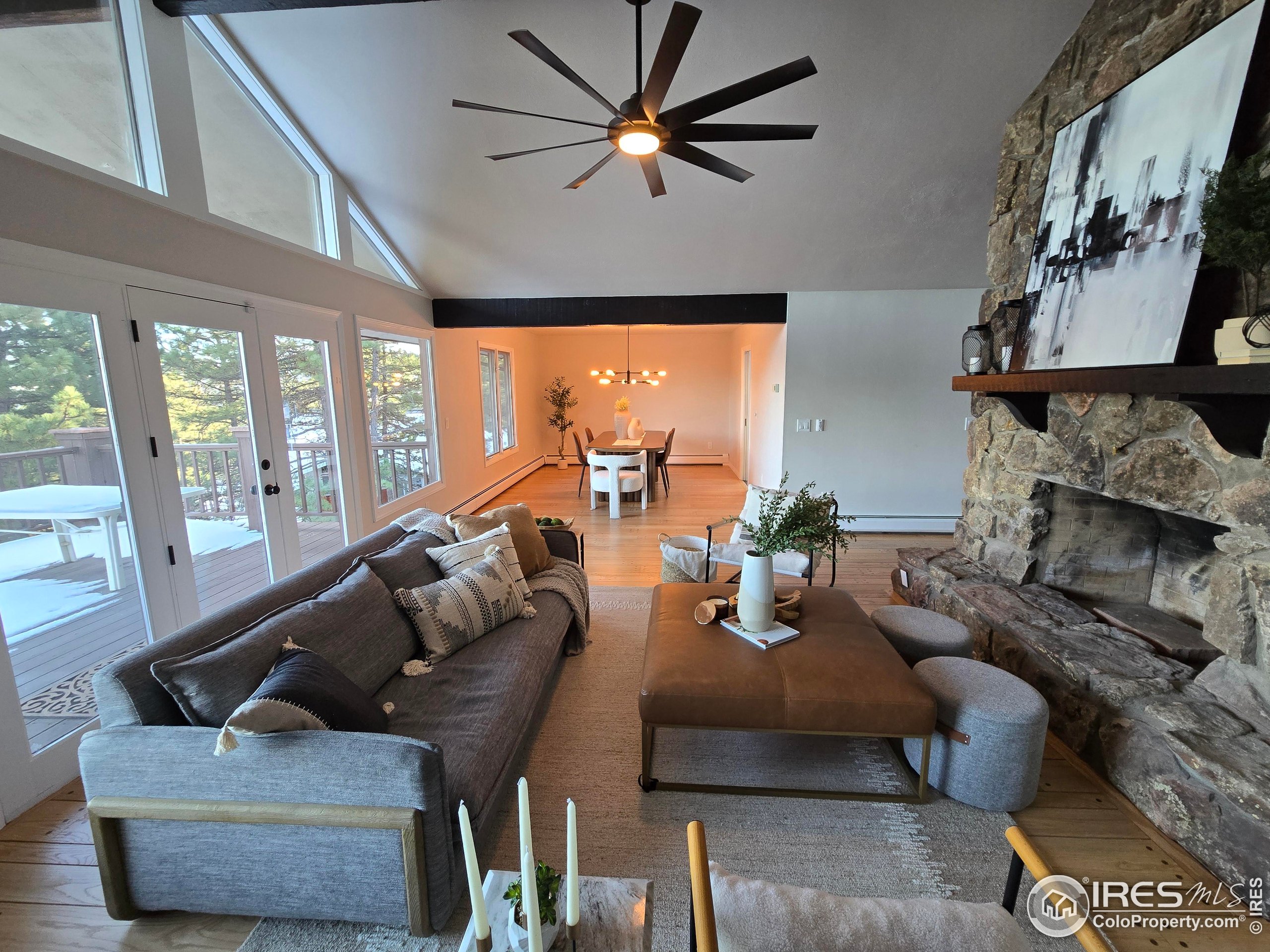 76 Pine Tree Lane Boulder, CO 80304 - Photo 8 of 49 a living room with furniture and a large window