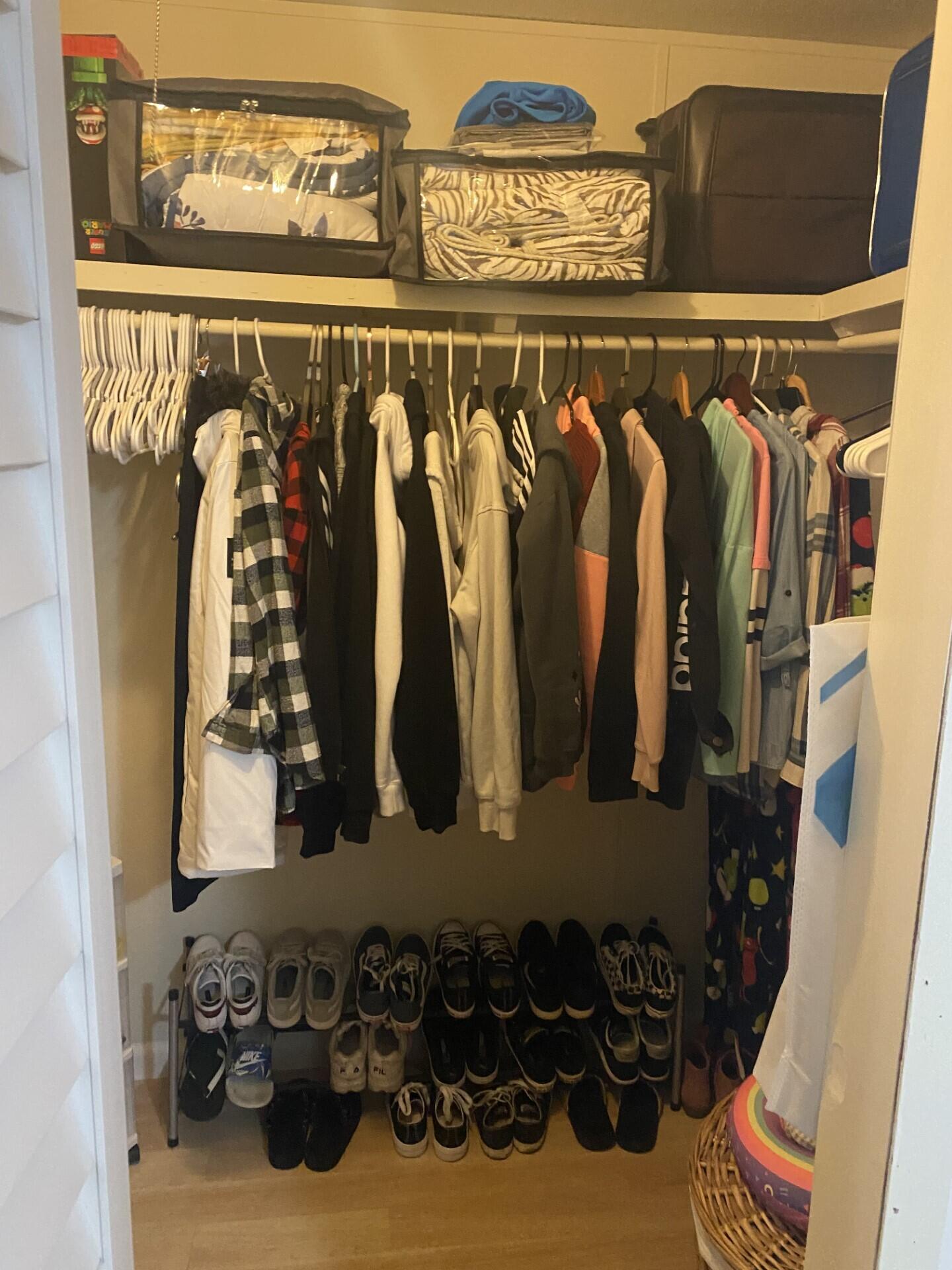 1531 Drexel Road West Palm Beach, FL 33417 - Photo 24 of 35 a view of walk in closet with clothes