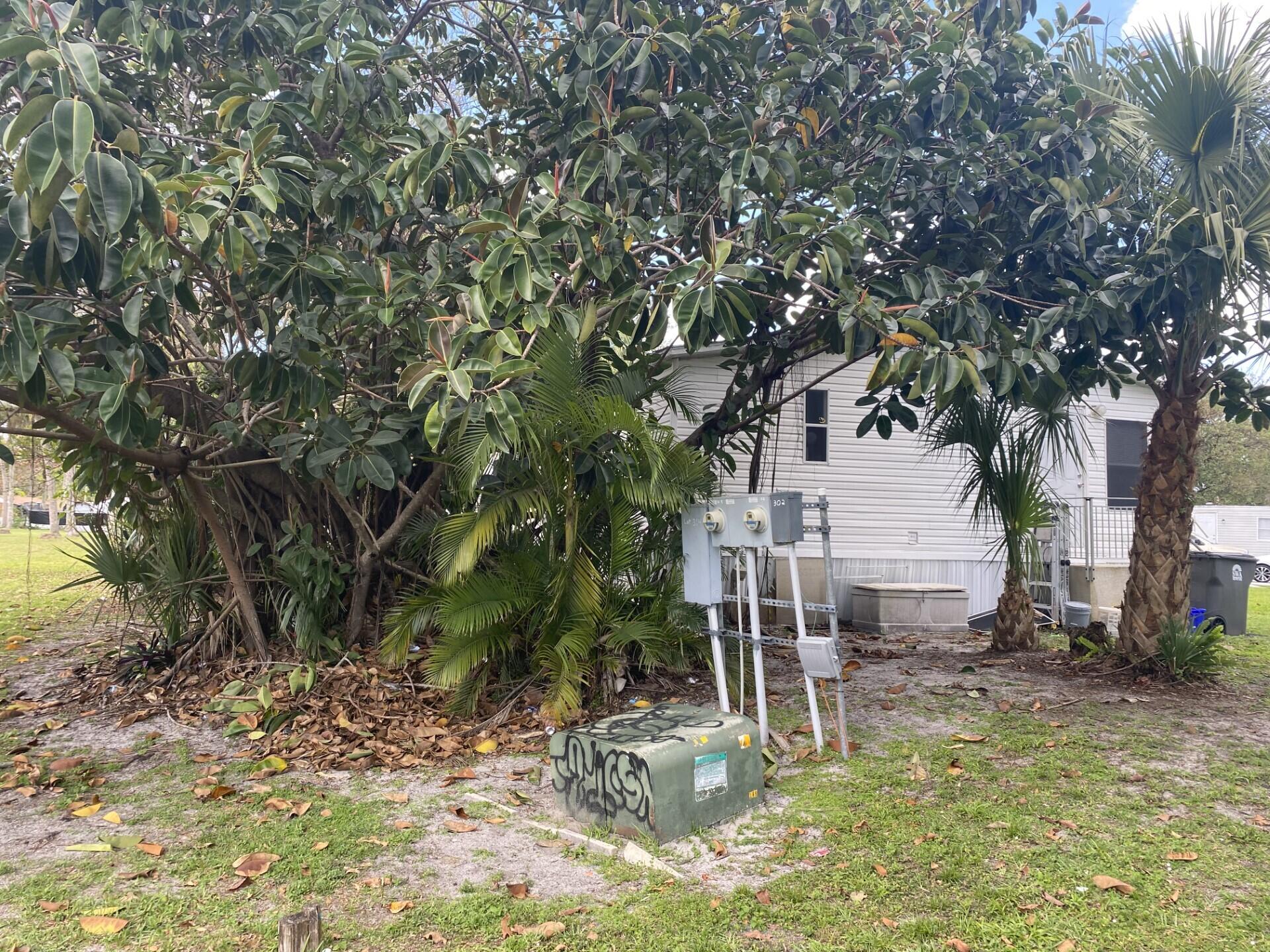 1531 Drexel Road West Palm Beach, FL 33417 - Photo 32 of 35 a view of a house with backyard