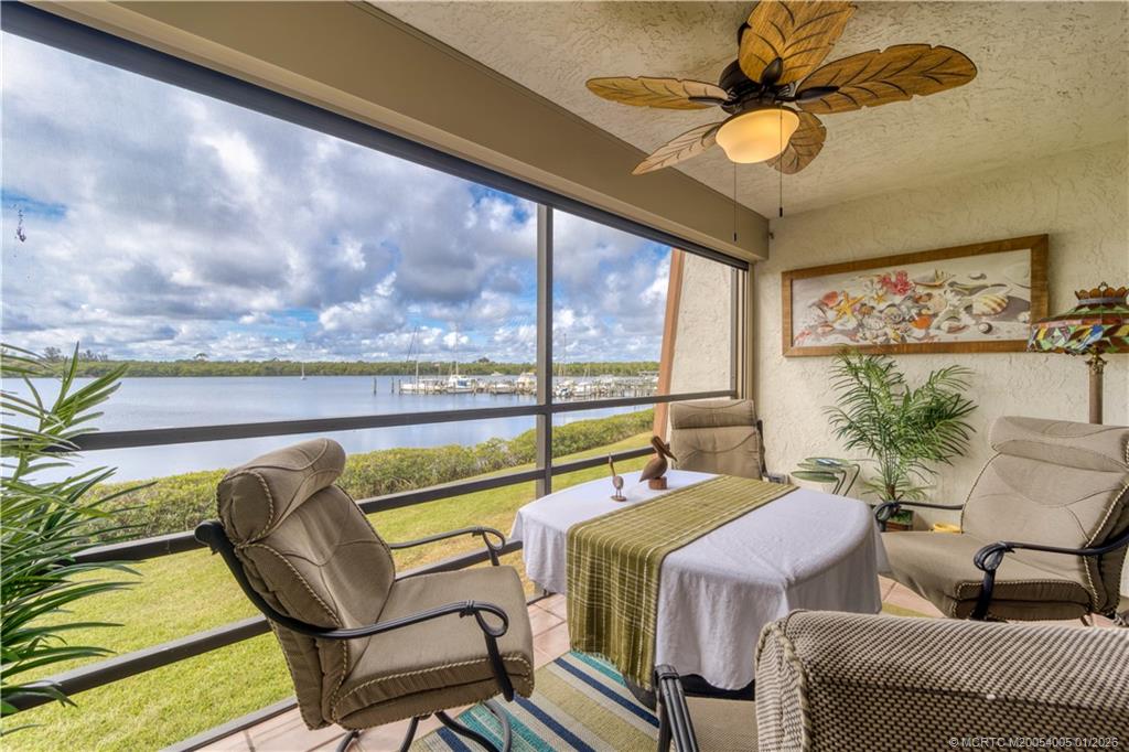 3100 Southeast Pruitt Road, Unit G205 Port St. Lucie, FL 34952 - Photo 14 of 29 a living room with furniture