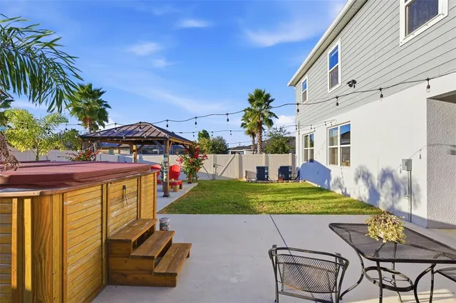 a view of an chairs and tables in the patio