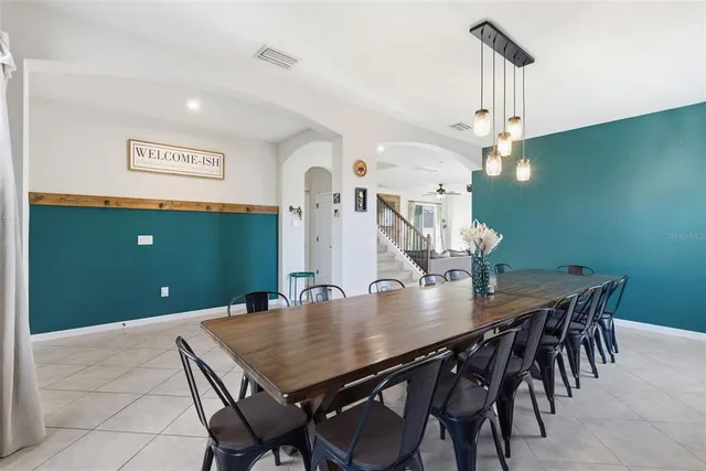 a view of a dining room with furniture