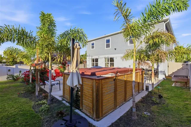 a front view of house with an outdoor space