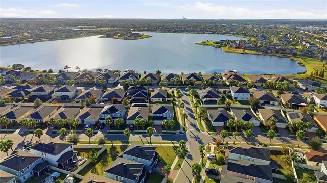a view of walk in closet with clothes