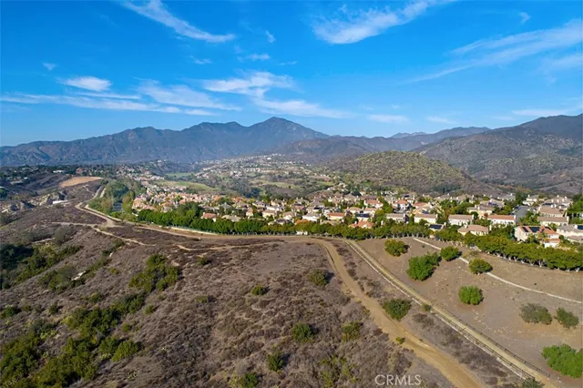 a view of a city with mountains in the background