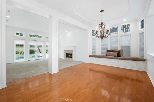 a bedroom with furniture and window