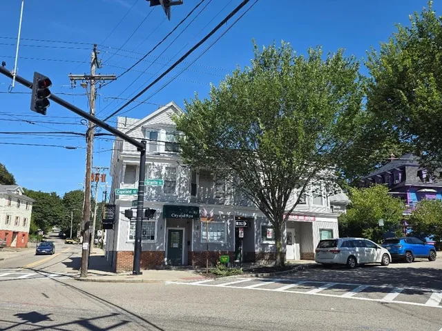 a view of a building with a street
