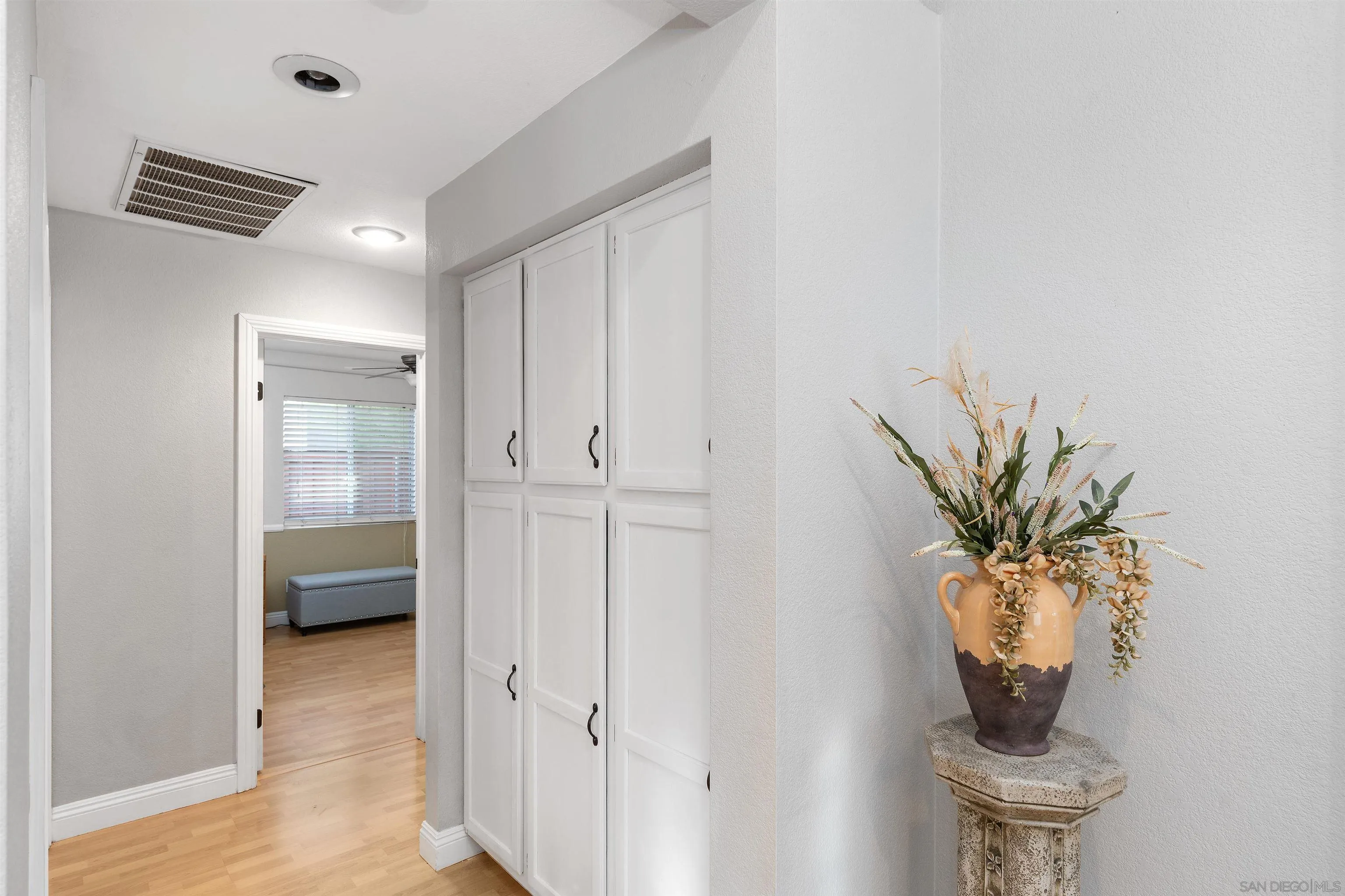 43070 Corte Salamanca Temecula, CA 92592 - Photo 11 of 30 a view of a hallway and wooden floor