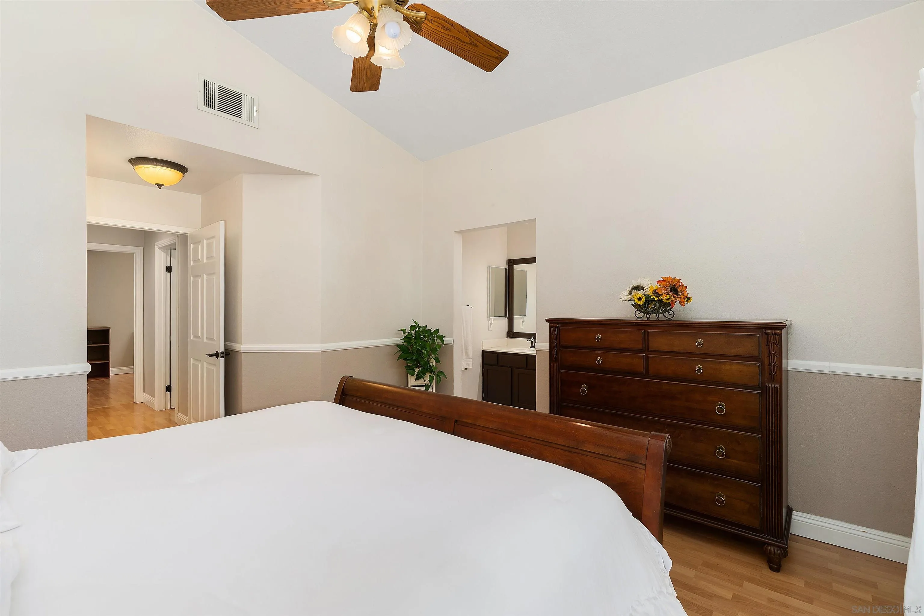 43070 Corte Salamanca Temecula, CA 92592 - Photo 12 of 30 a bedroom with a bed and a dresser