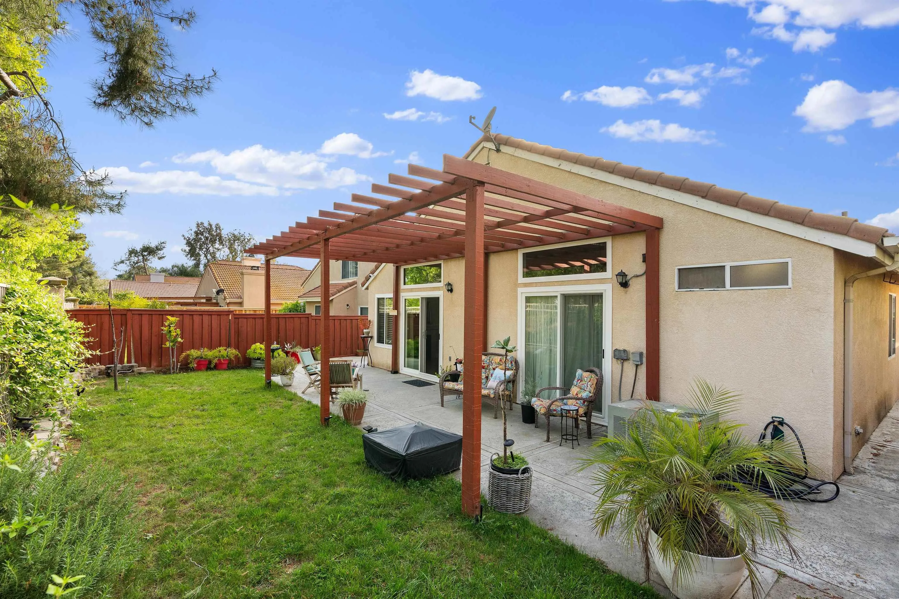 43070 Corte Salamanca Temecula, CA 92592 - Photo 20 of 30 a view of a chair and table in backyard of the house