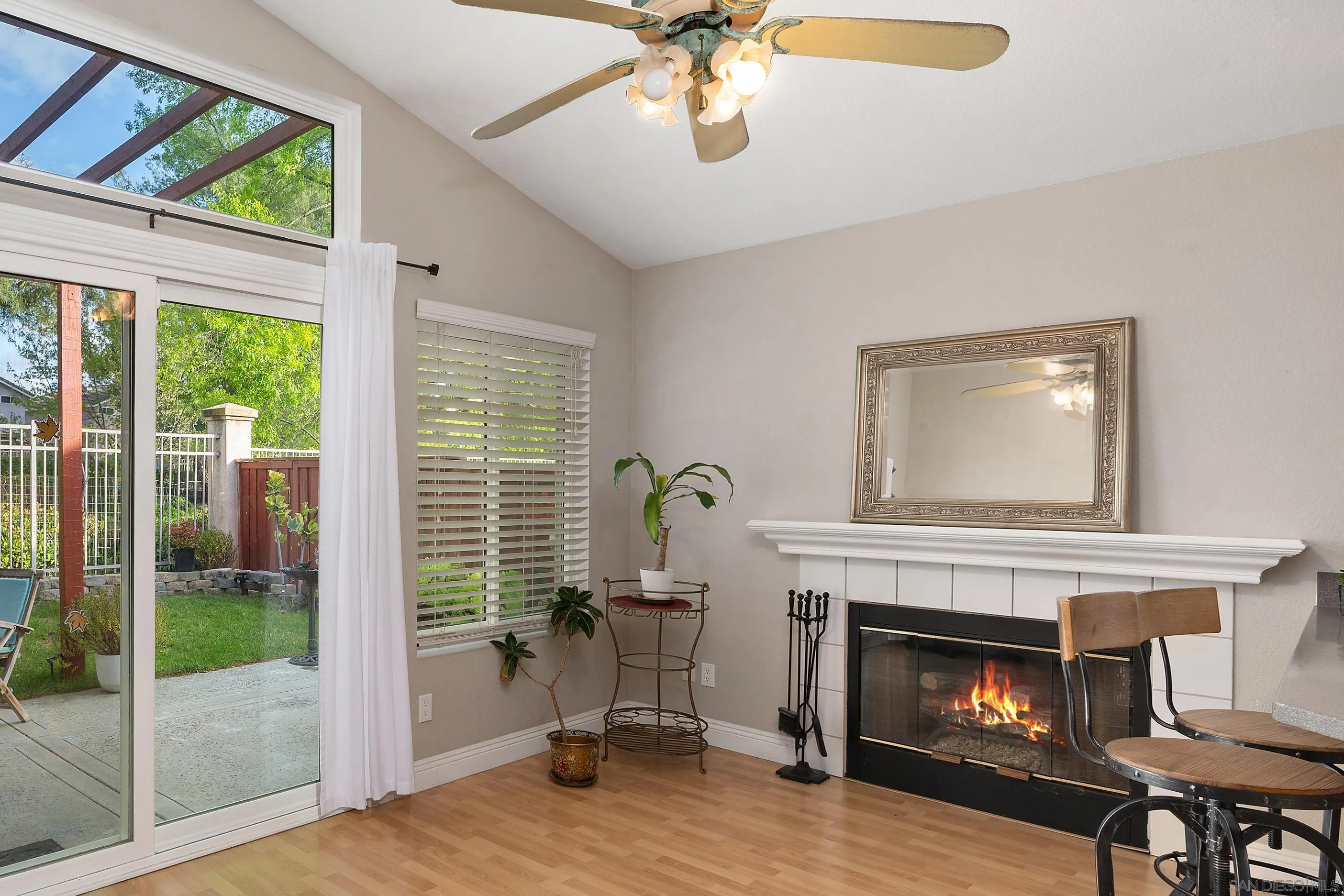 43070 Corte Salamanca Temecula, CA 92592 - Photo 5 of 30 a living room with furniture and a fireplace