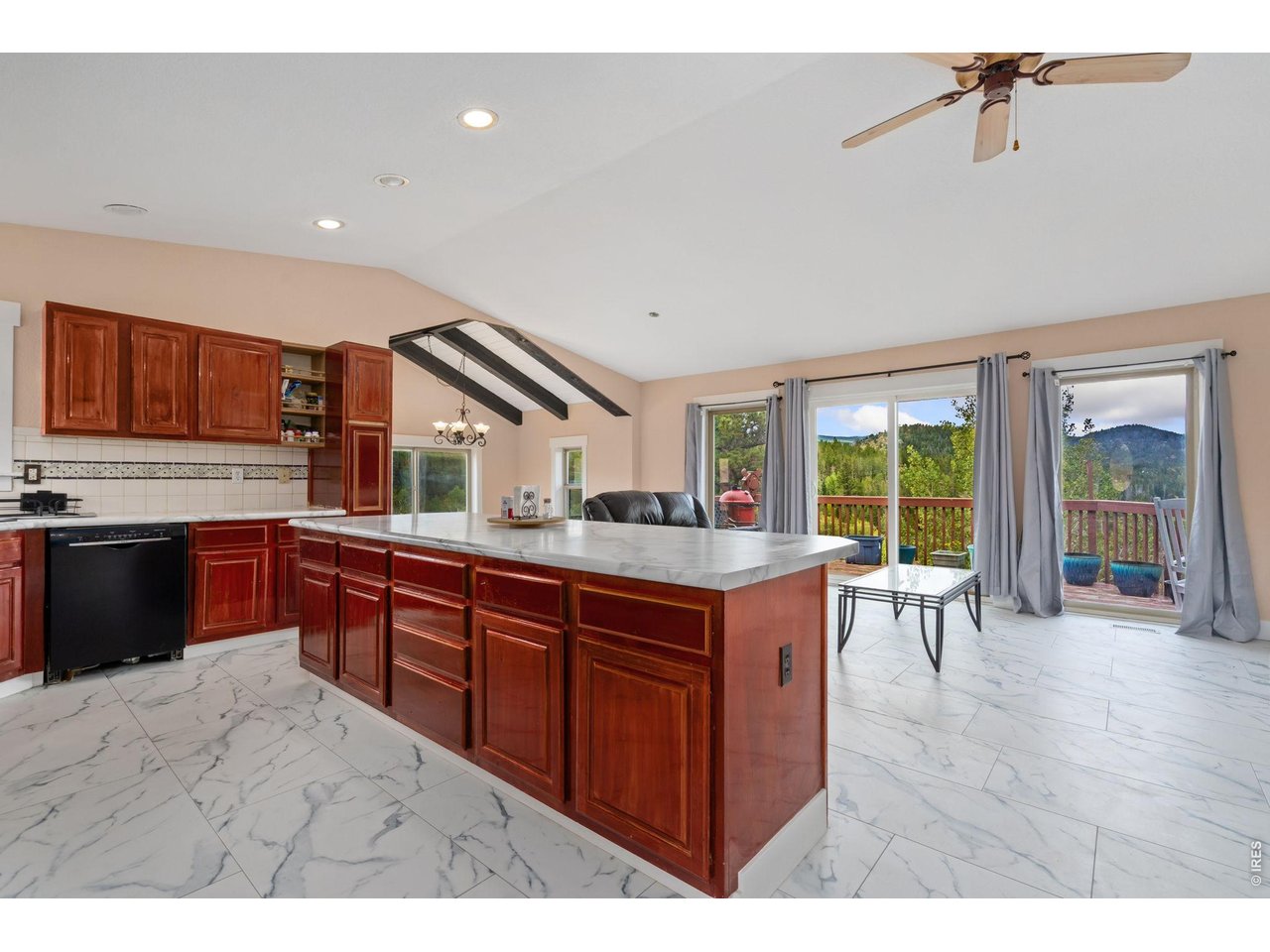 141 Tami Road Red Feather Lakes, CO 80545 - Photo 4 of 45 Large island/breakfast bar overlooking the the great room.