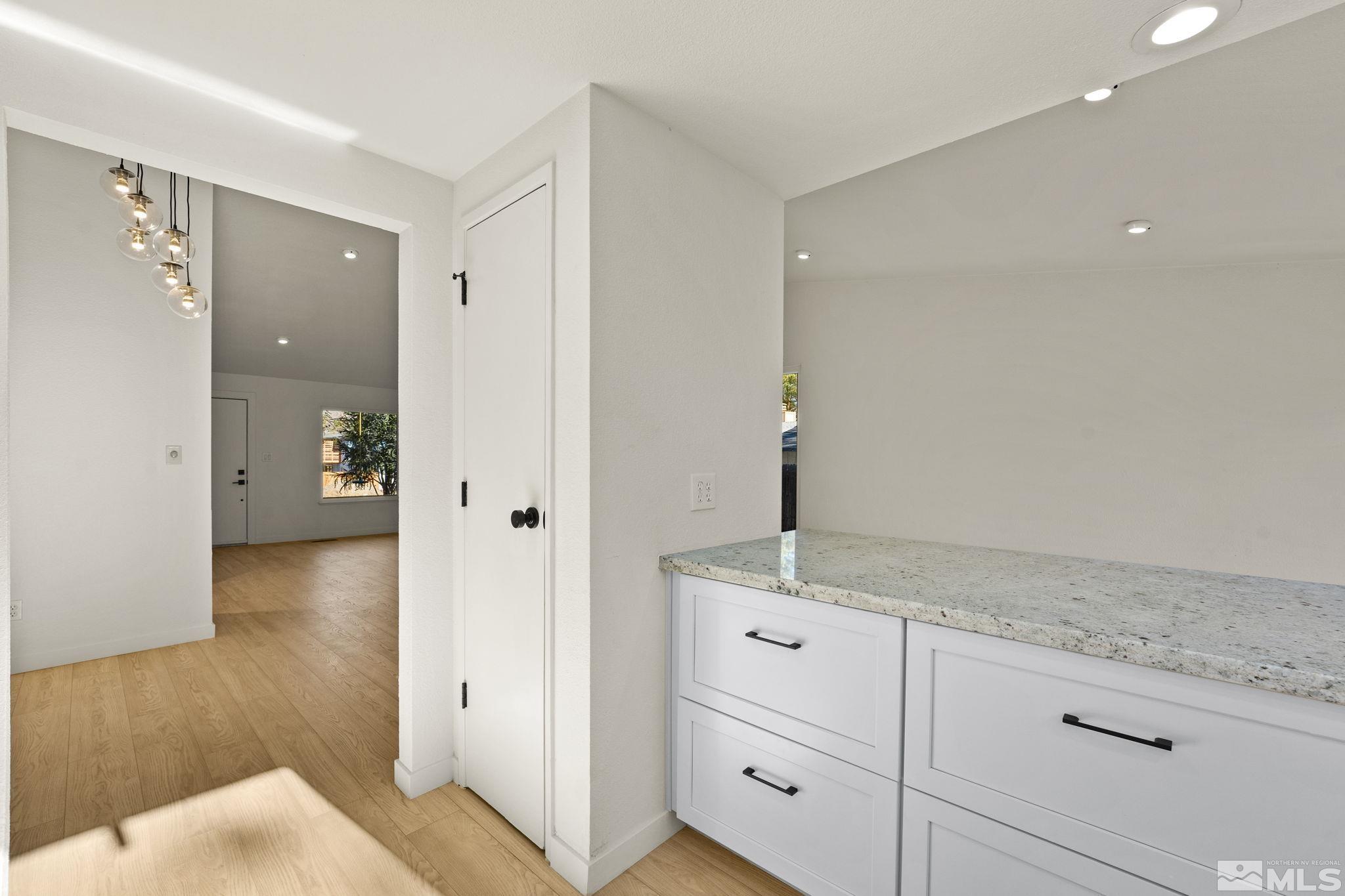 1720 Kings Row Reno, NV 89503 - Photo 18 of 39 a view of hallway with wooden floor