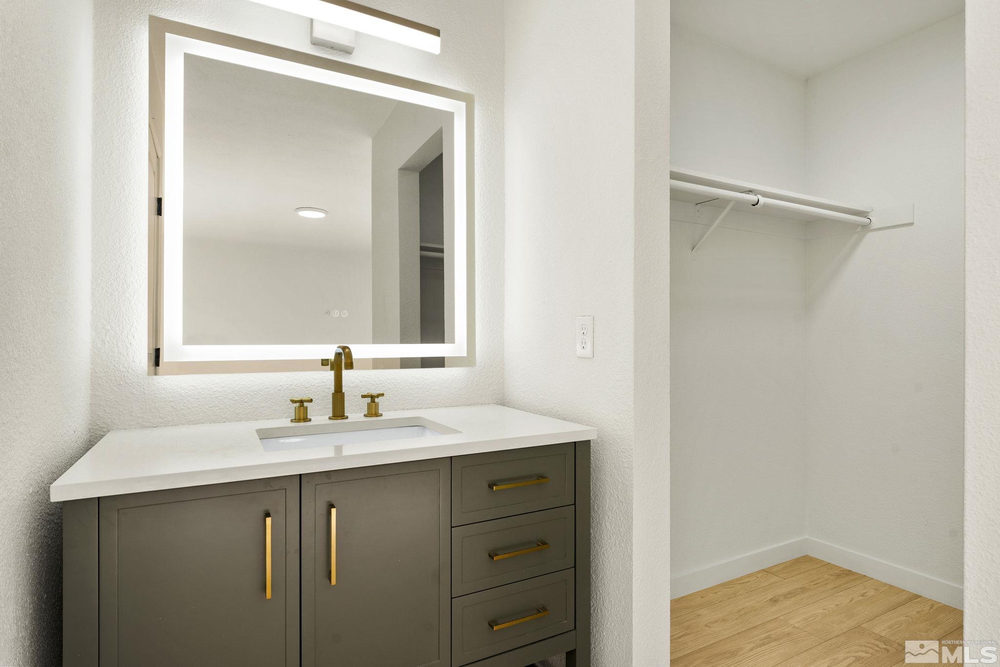 1720 Kings Row Reno, NV 89503 - Photo 24 of 39 a bathroom with a sink and a mirror