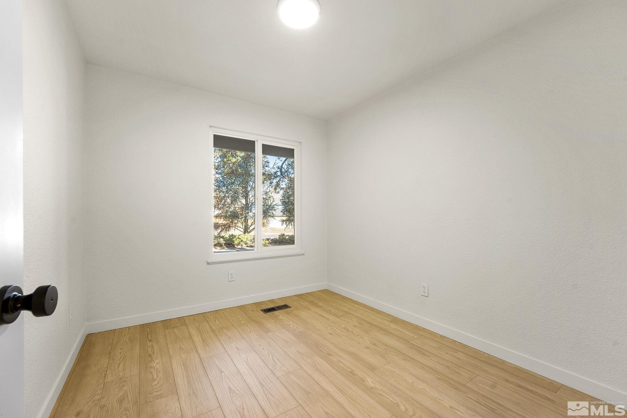1720 Kings Row Reno, NV 89503 - Photo 27 of 39 an empty room with a window