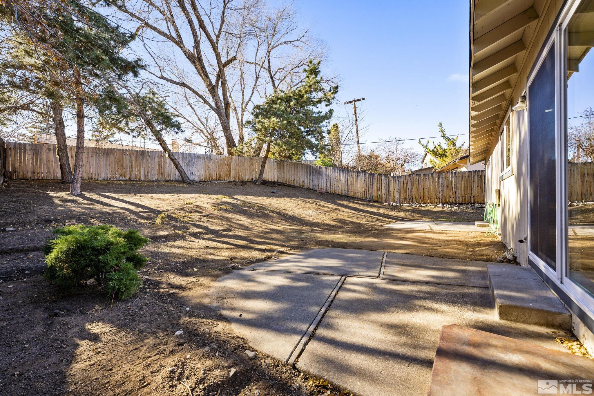 1720 Kings Row Reno, NV 89503 - Photo 34 of 39 a view of a backyard of the house