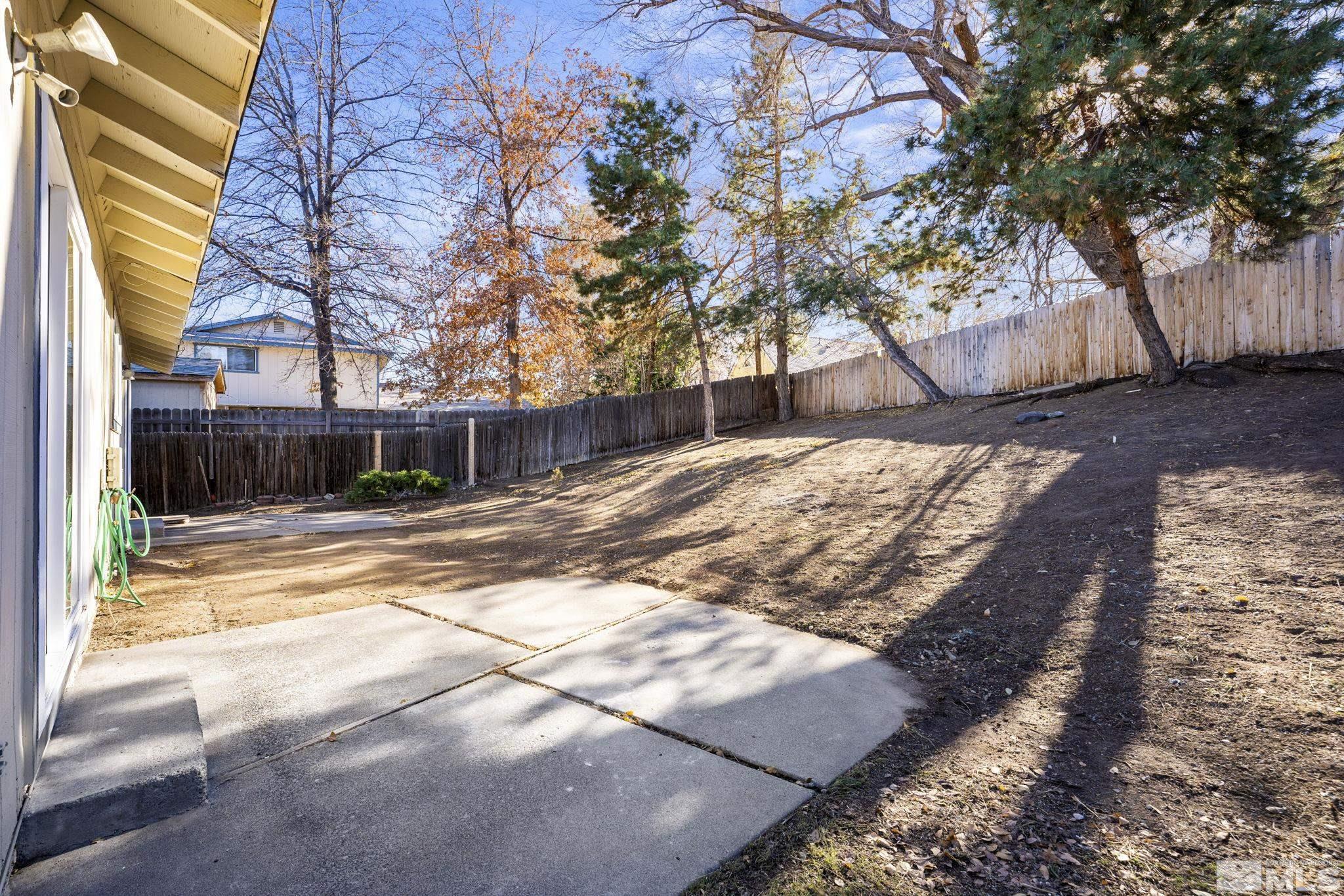 1720 Kings Row Reno, NV 89503 - Photo 37 of 39 a view of a yard with a tree