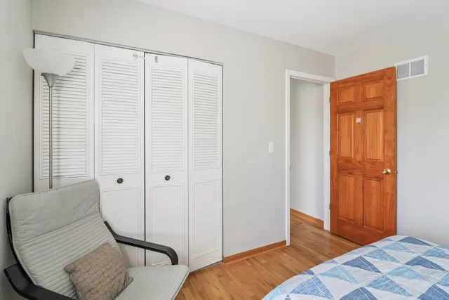 a view of a livingroom with furniture and wooden floor