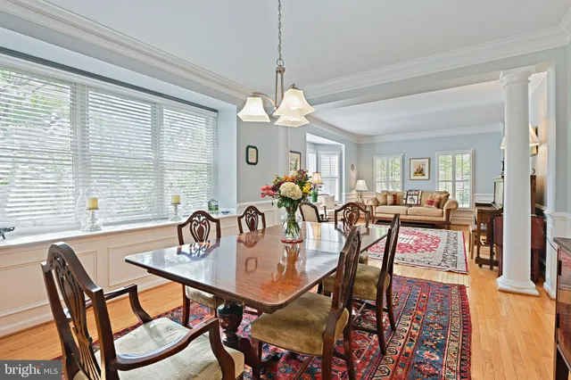 a view of a dining room and livingroom with furniture
