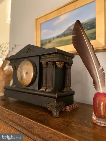 a kitchen with a sink window and cabinets
