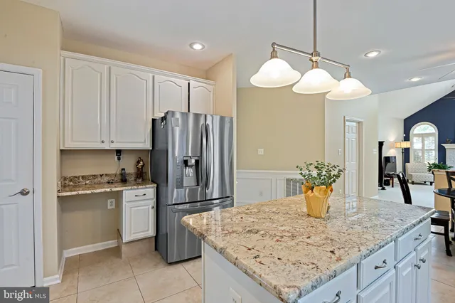 a view of a bathroom with a window and a shower