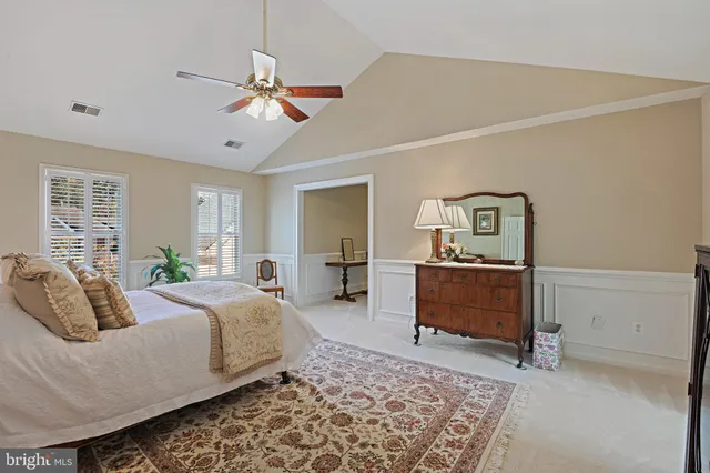 a view of a hallway with a staircase