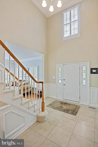 a view of an entryway with staircase