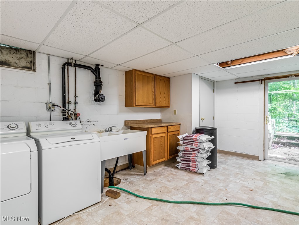 3087 Baughman Road Clinton, OH 44216 - Photo 22 of 24 Laundry area featuring cabinets and washing machine and dryer