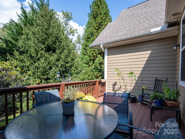 a view of balcony with deck and seating space