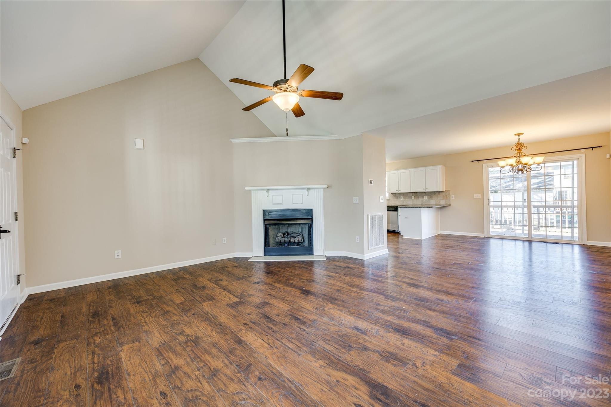 573 Strathclyde Way Rock Hill, SC 29730 - Photo 6 of 21 a view of empty room with wooden floor and fireplace
