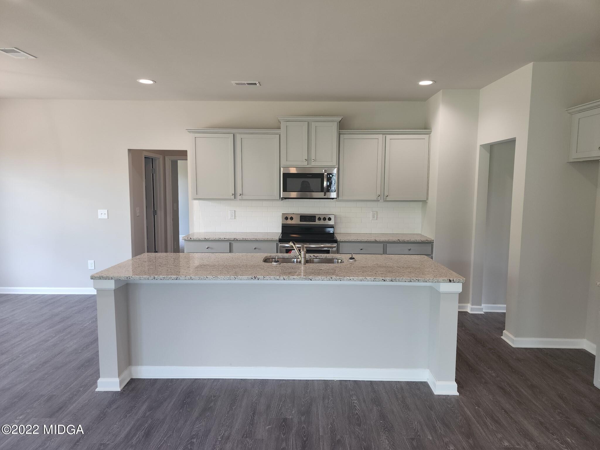 271 Presidents Way Forsyth, GA 31029 - Photo 3 of 23 003 Lakesurst kitchen view