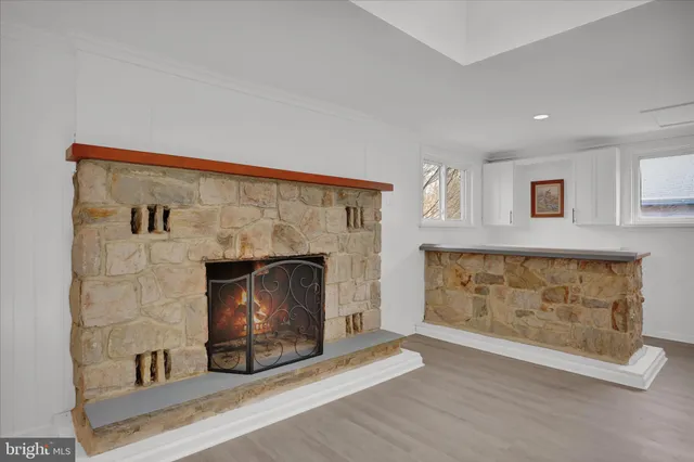 a living room with a fireplace