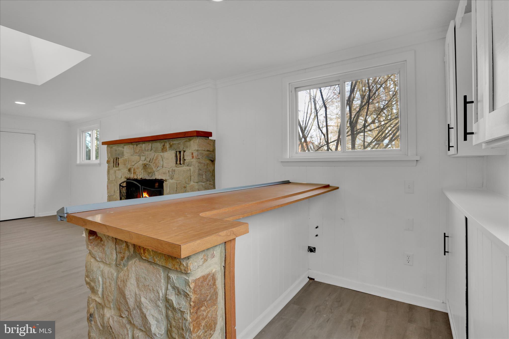 405 State Street Reading, PA 19607 - Photo 22 of 42 a room with a table and a fireplace