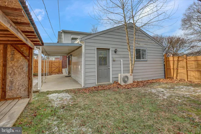 a view of backyard with cabin