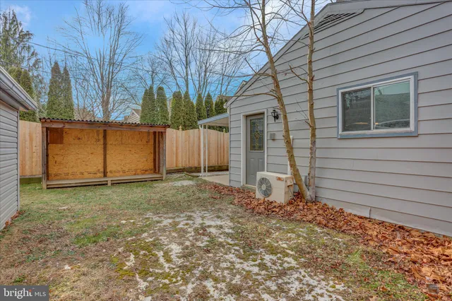 a house with trees in front of it