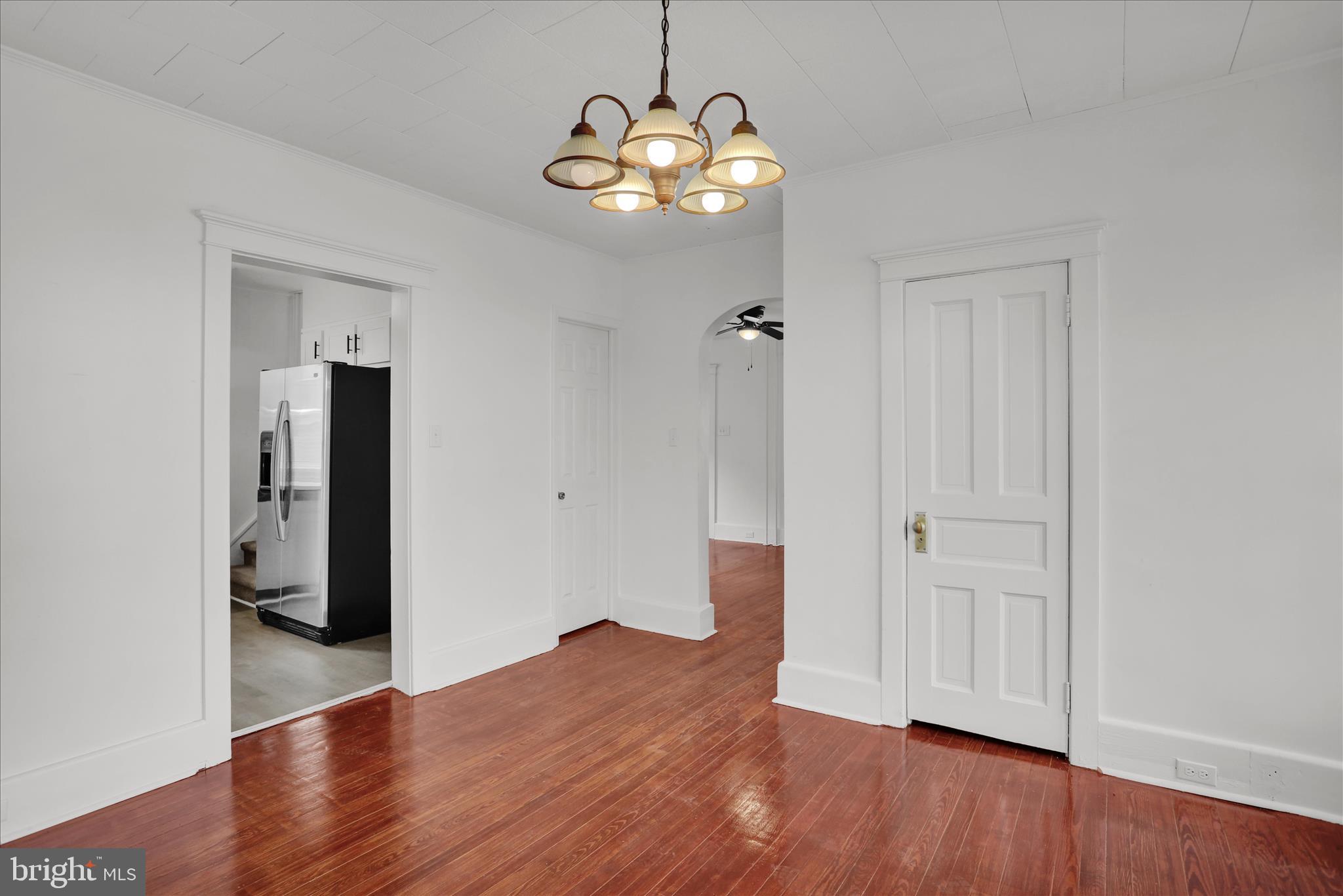 405 State Street Reading, PA 19607 - Photo 10 of 42 wooden floor in an empty room with a window