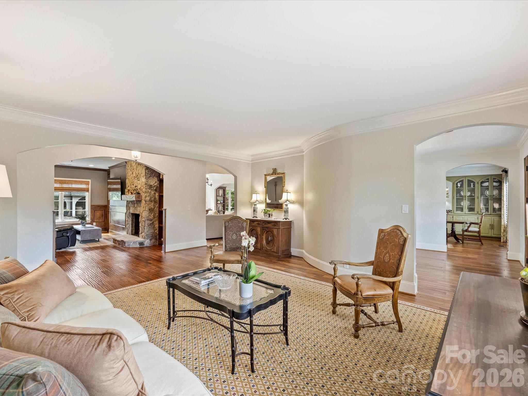 4330 Carmel Valley Road Charlotte, NC 28226 - Photo 15 of 38 a living room with furniture and wooden floor