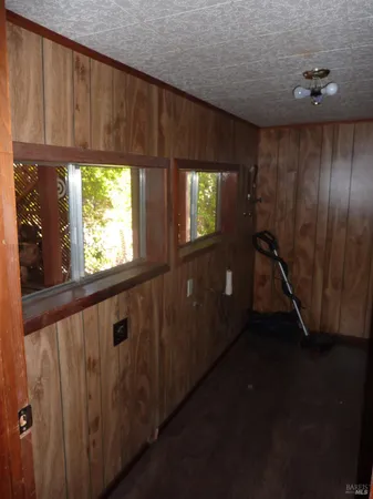a view of a house with a tree