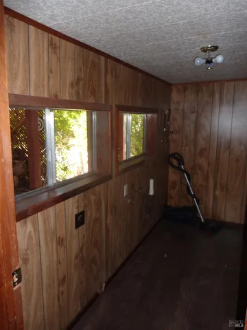 a view of a house with a tree