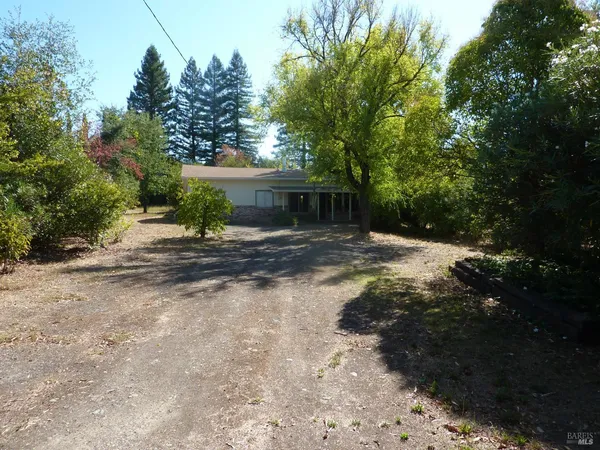 a view of backyard with green space