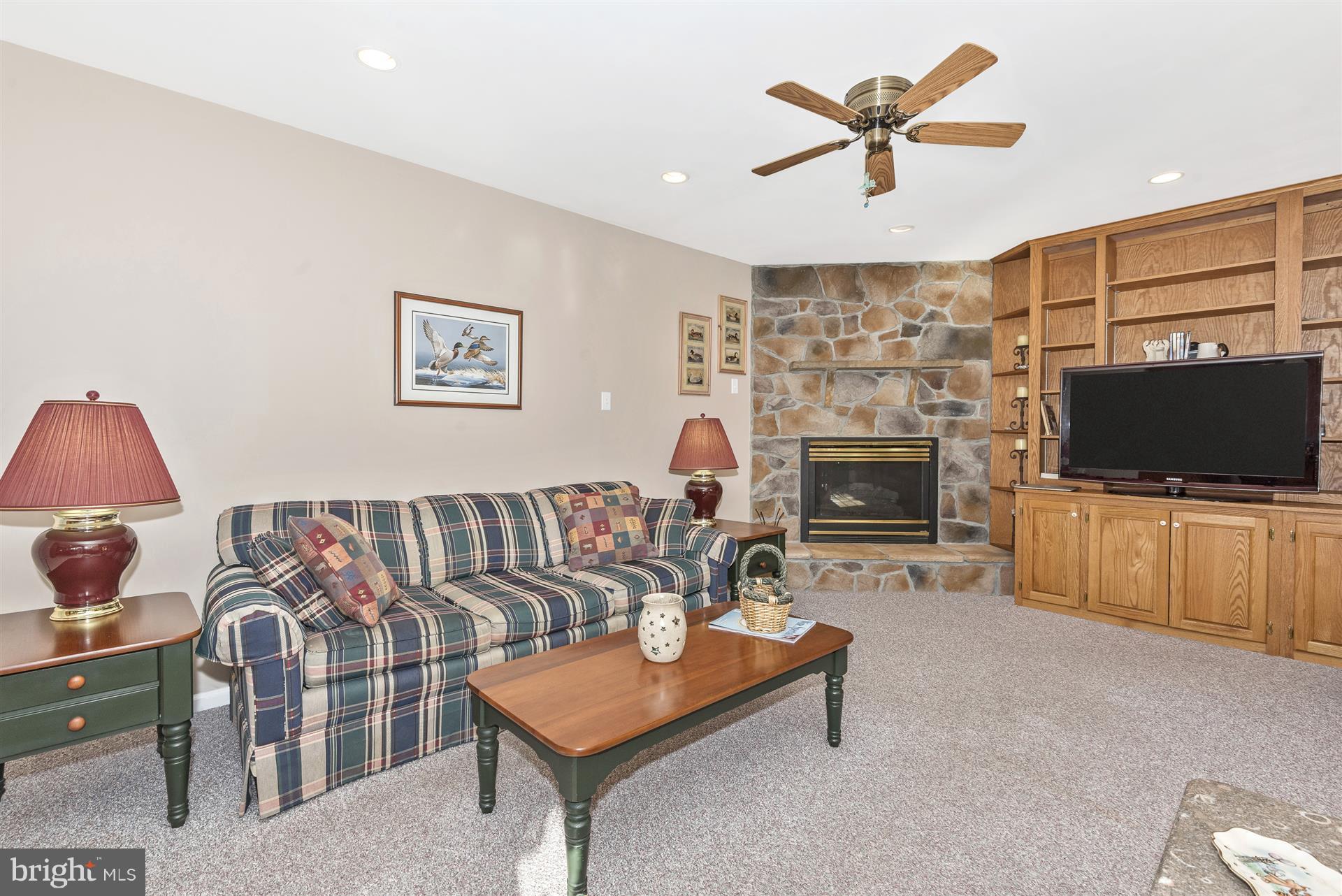 6733 Oakridge Road New Market, MD 21774 - Photo 16 of 30 Cozy fireplace and built in entertainment center