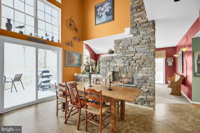view of a dining room with furniture window and wooden floor