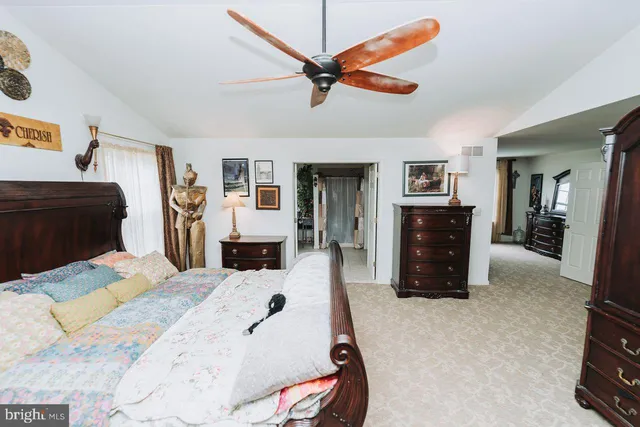 a bathroom with a bathtub a sink and a shower curtain