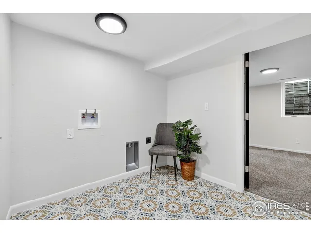 a patio with table and chairs