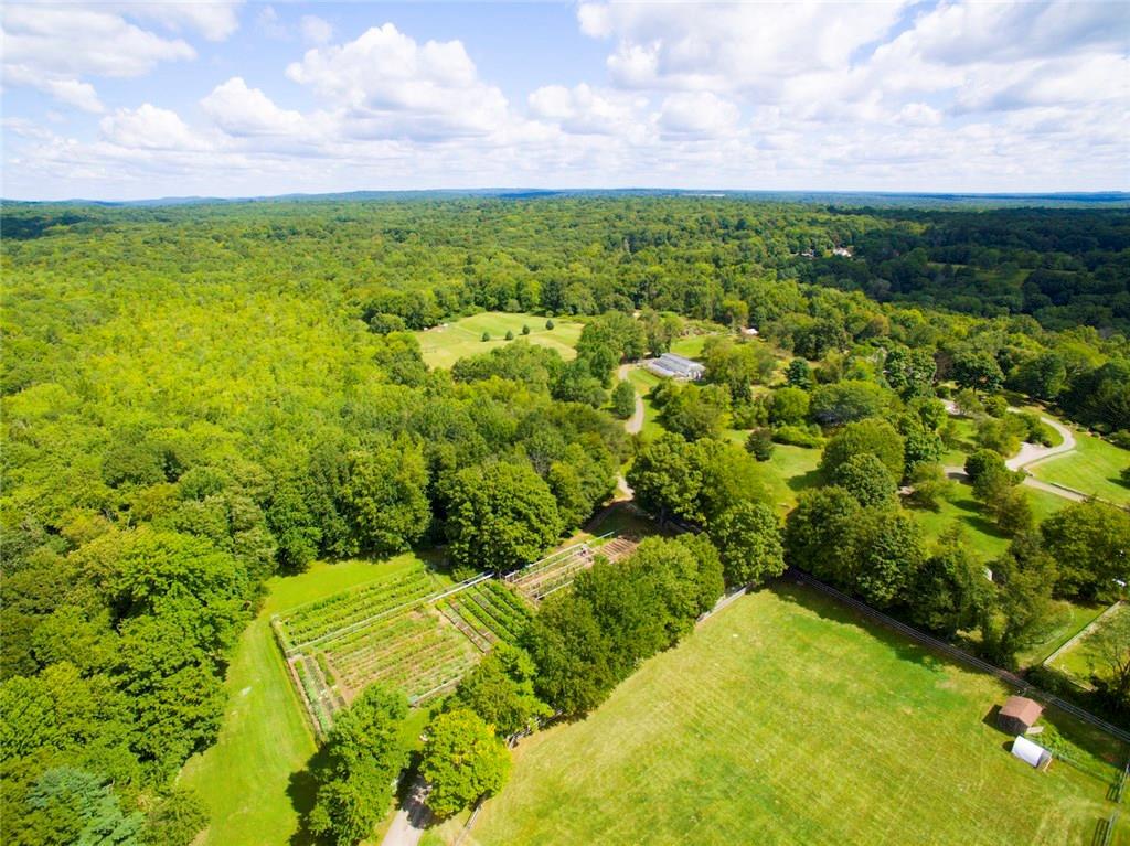 a view of a yard with an outdoor seating