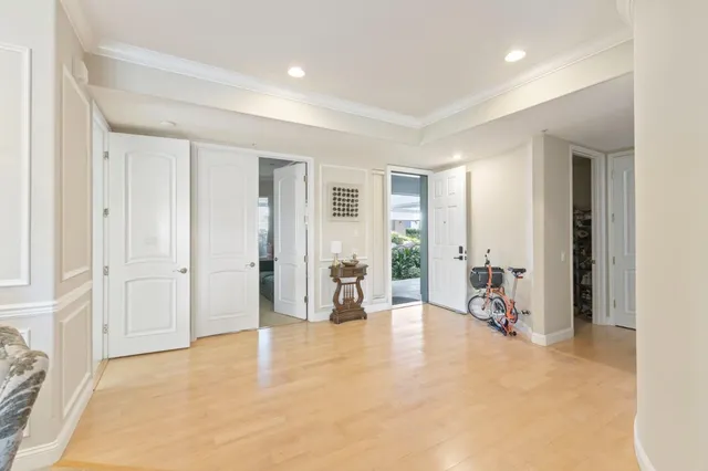 an empty room with furniture and a window